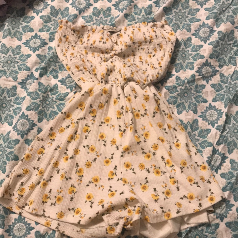 A white and yellow romper